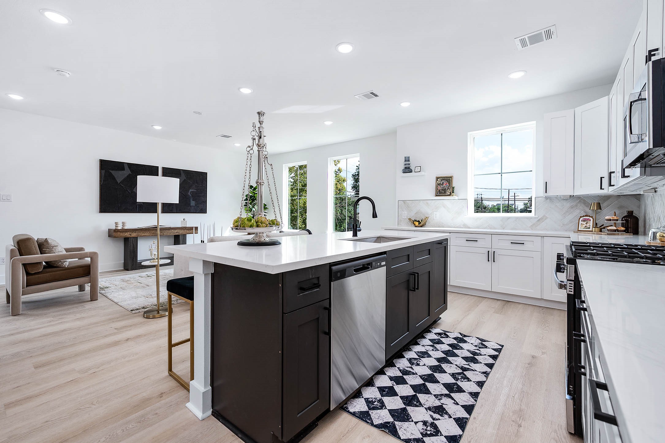 1515 Euel Street Houston, TX 77009 - Photo 18 of 34 Kitchen island centerpiece providing additional prep space, storage, and a casual gathering spot.