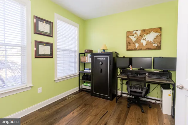 a bathroom with a bathtub and a toilet