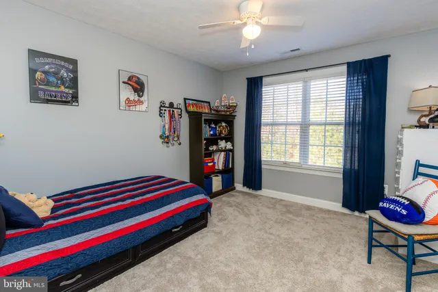 a bathroom with a toilet and a sink