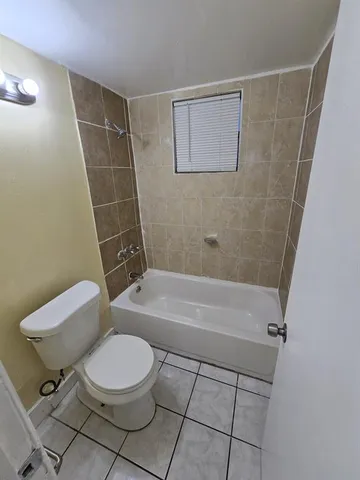 a car parked in front of a house