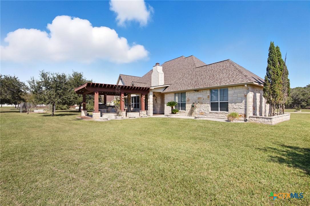 130 Post Oak Circle Inez, TX 77968 - Photo 47 of 48 a front view of a house with garden