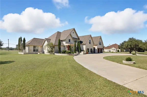 a view of houses with outdoor space and swimming pool