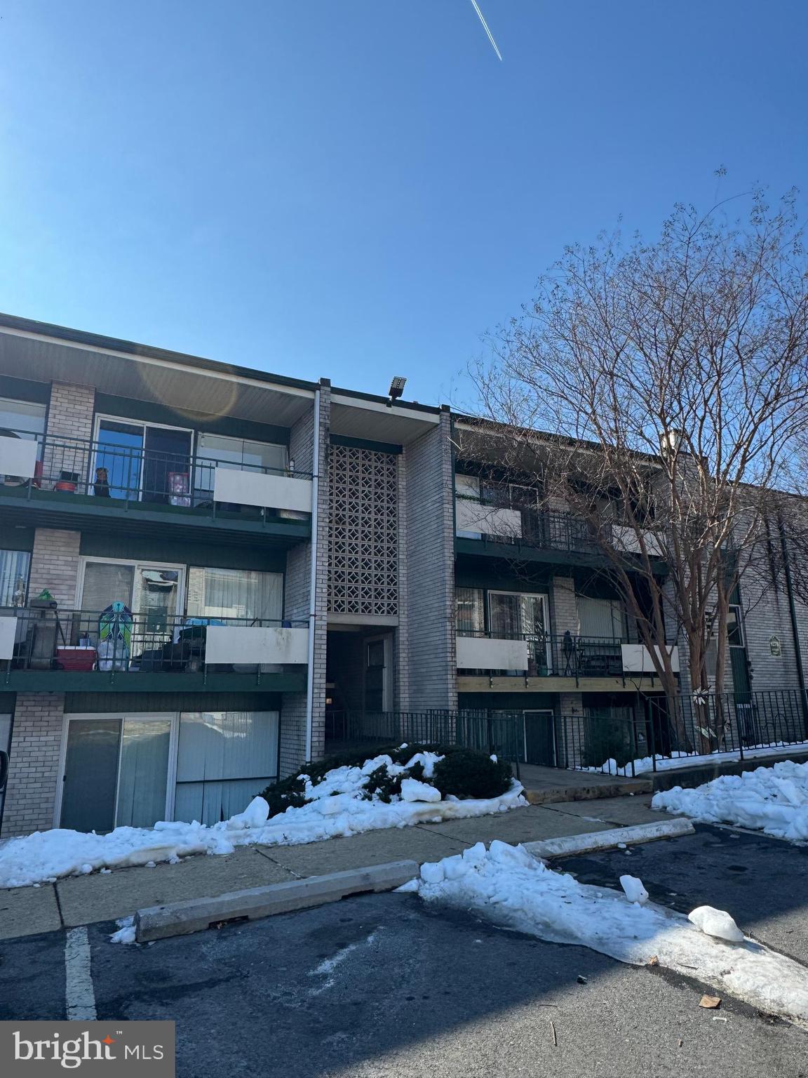 9278 Adelphi Road, Unit 103 Hyattsville, MD 20783 - Photo 1 of 24 a front view of a house with sitting area