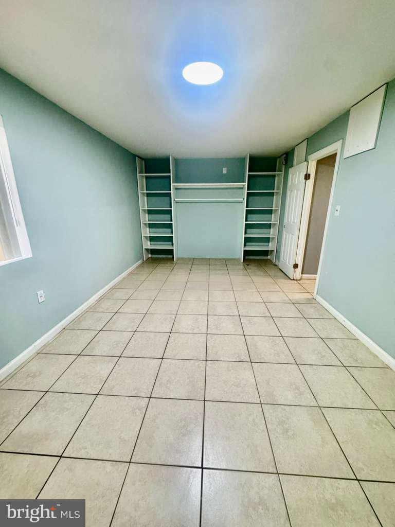 9278 Adelphi Road, Unit 103 Hyattsville, MD 20783 - Photo 18 of 24 a view of empty room