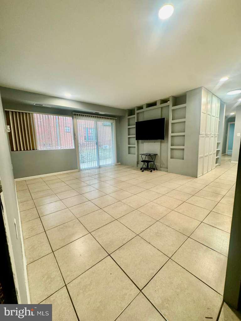9278 Adelphi Road, Unit 103 Hyattsville, MD 20783 - Photo 2 of 24 a view of livingroom with furniture