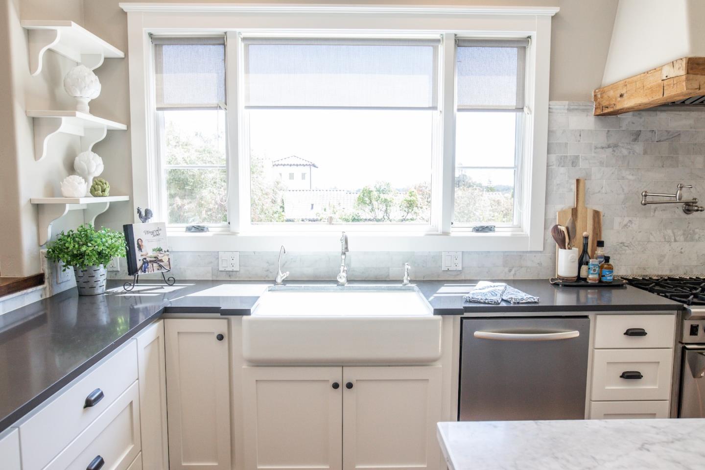 3430 Merrill Road Aptos, CA 95003 - Photo 12 of 49 a kitchen with a sink stove and cabinets