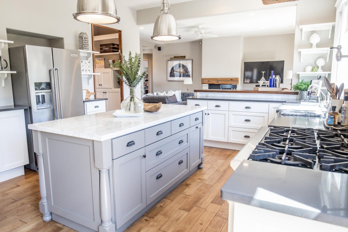 3430 Merrill Road Aptos, CA 95003 - Photo 13 of 49 a kitchen with stainless steel appliances a sink stove and refrigerator