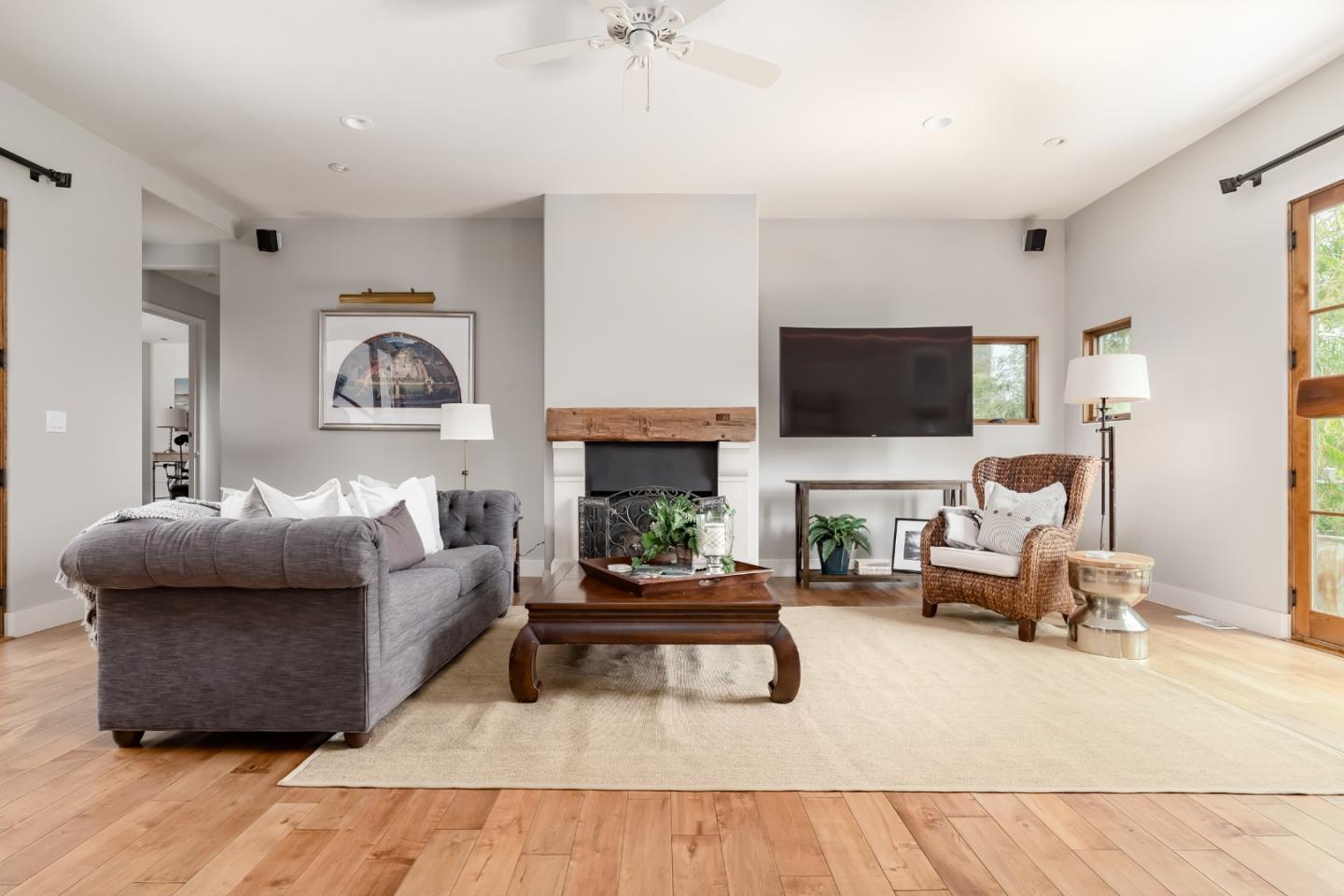 3430 Merrill Road Aptos, CA 95003 - Photo 19 of 49 a living room with furniture and a fireplace