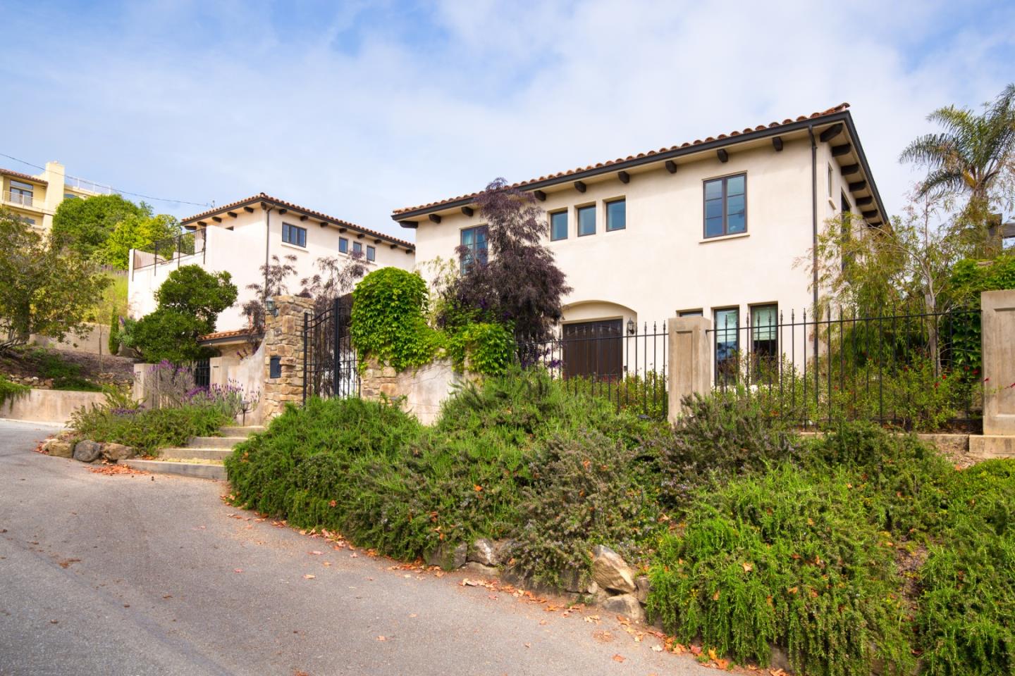 3430 Merrill Road Aptos, CA 95003 - Photo 2 of 49 a bathroom with a sink and mirror