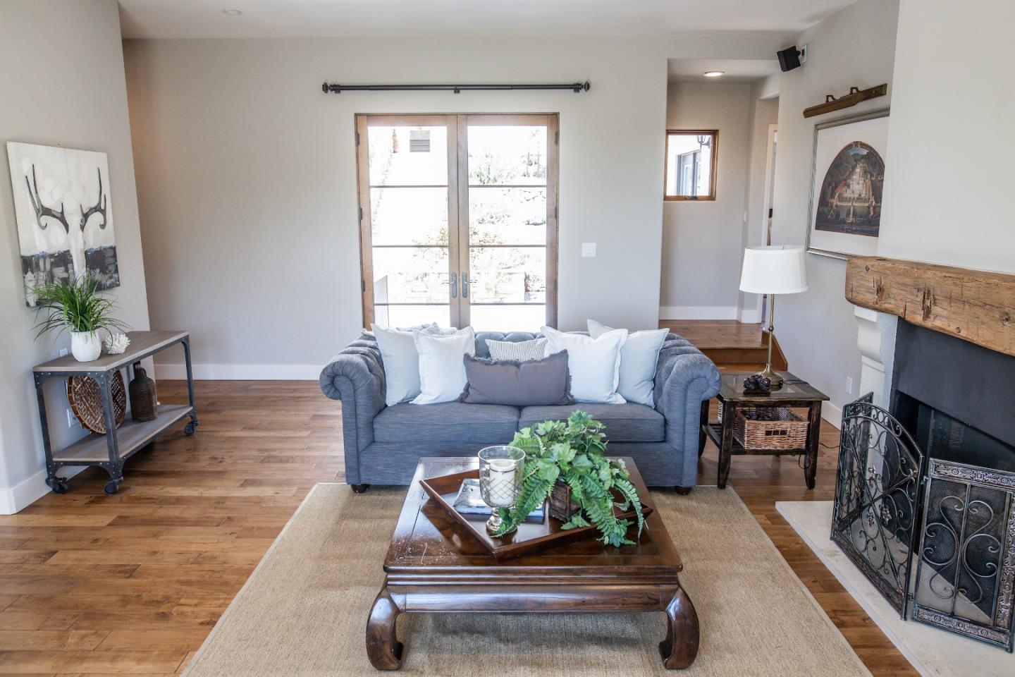 3430 Merrill Road Aptos, CA 95003 - Photo 21 of 49 a living room with furniture and a fireplace