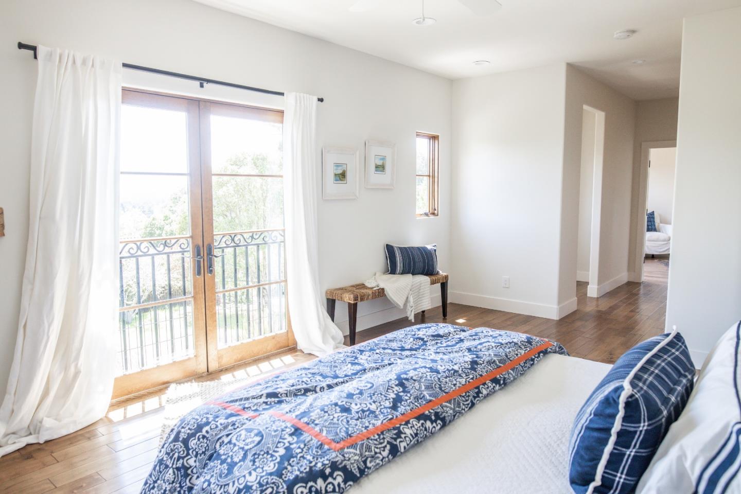 3430 Merrill Road Aptos, CA 95003 - Photo 31 of 49 a bedroom with a large bed and a couch