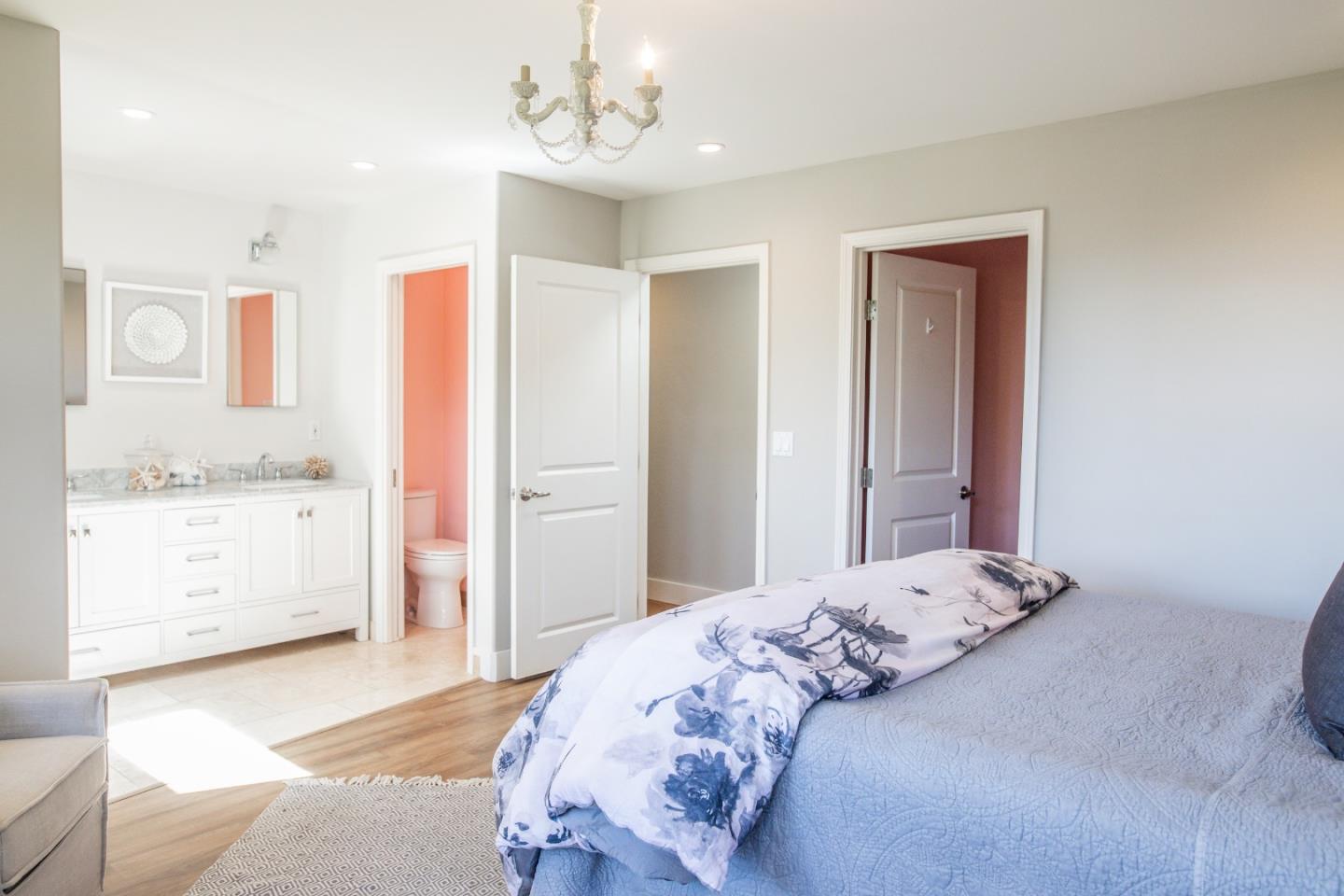 3430 Merrill Road Aptos, CA 95003 - Photo 38 of 49 a bedroom with a bed and a dresser