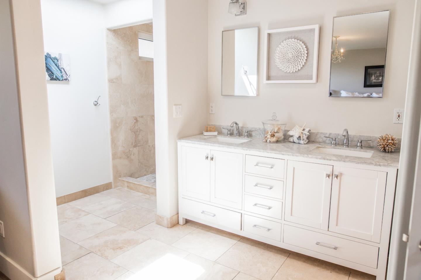 3430 Merrill Road Aptos, CA 95003 - Photo 43 of 49 a bathroom with a sink and a mirror