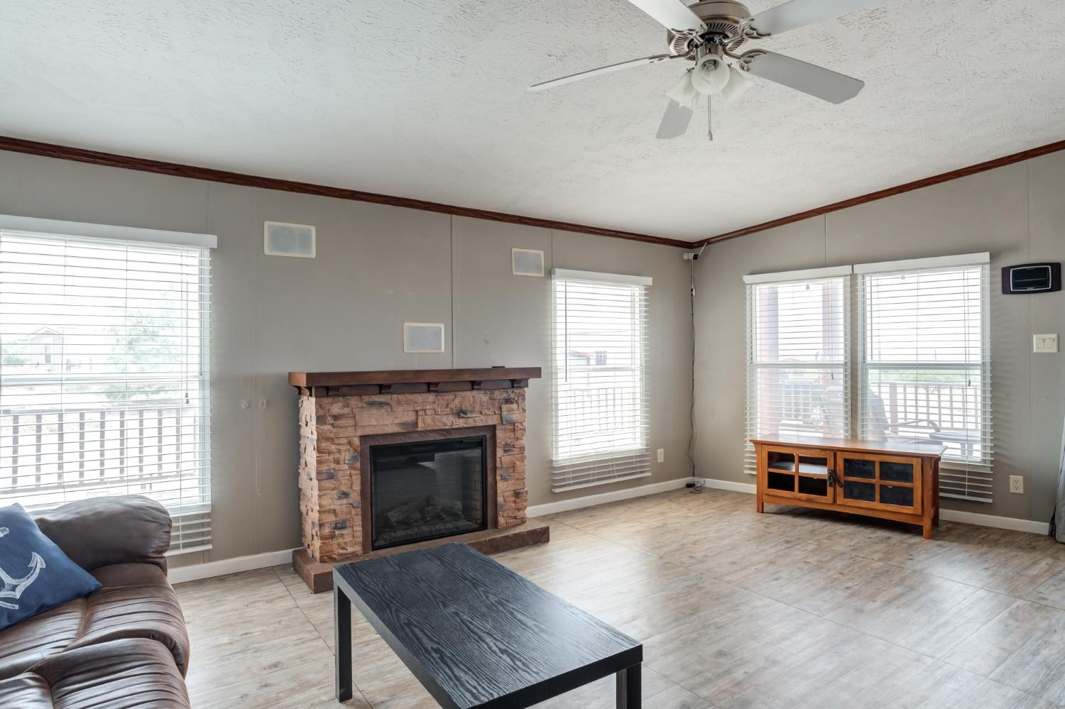 2446 Turkey Ridge Justiceburg, TX 79330 - Photo 12 of 50 a living room with furniture and a fireplace