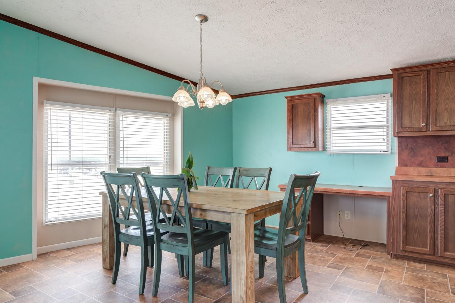 2446 Turkey Ridge Justiceburg, TX 79330 - Photo 14 of 50 a view of a dining room with furniture and window