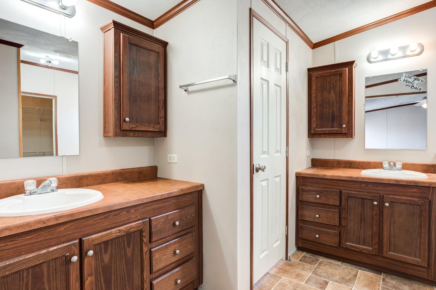 2446 Turkey Ridge Justiceburg, TX 79330 - Photo 30 of 50 a bathroom with a sink a vanity and a mirror