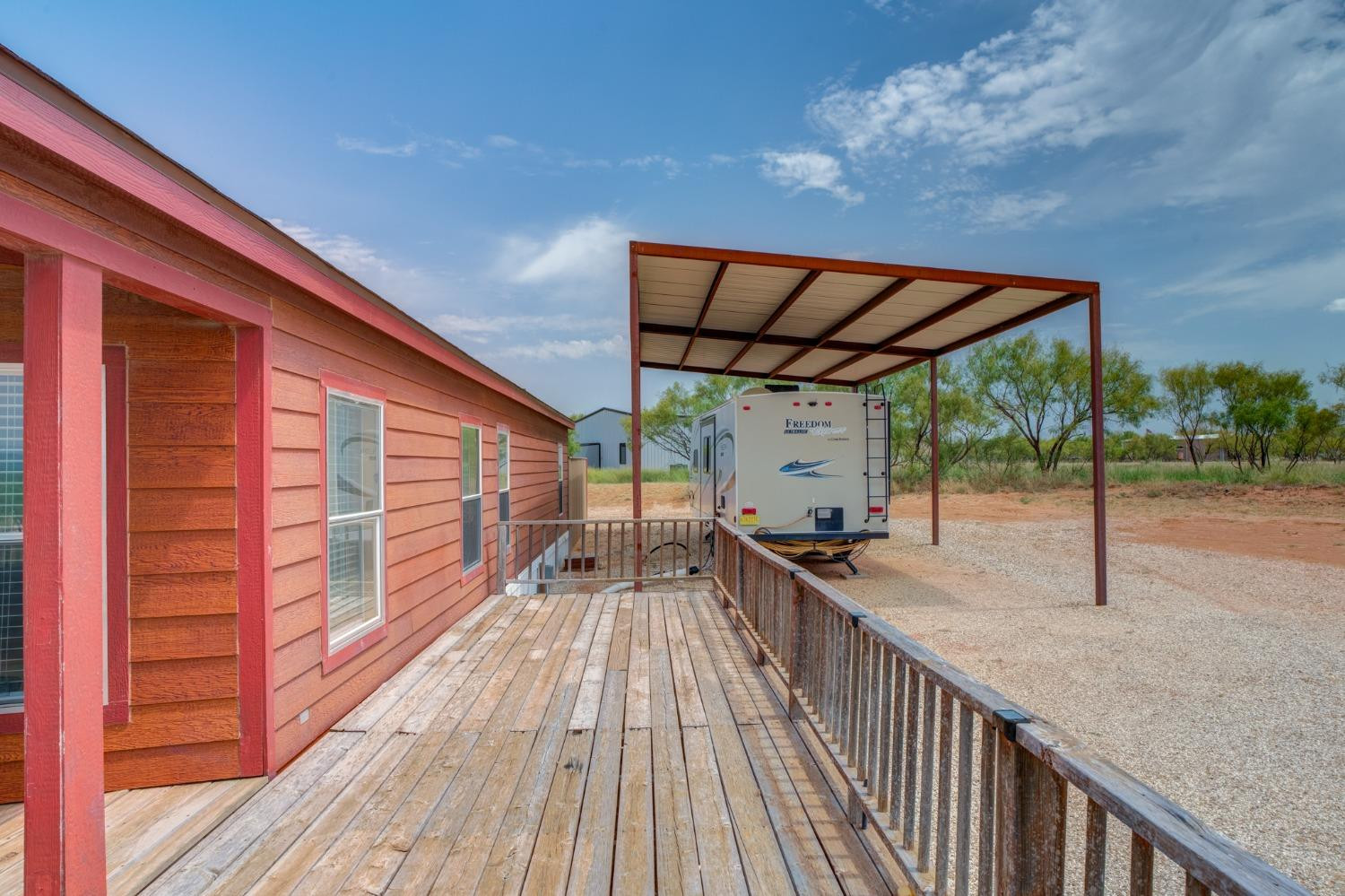 2446 Turkey Ridge Justiceburg, TX 79330 - Photo 6 of 50 a view of two chairs in the balcony