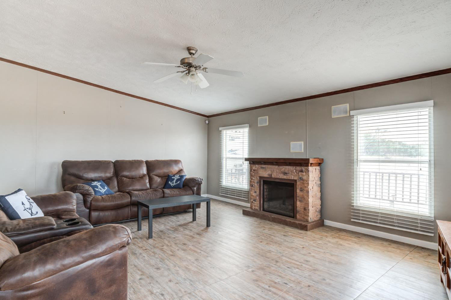 2446 Turkey Ridge Justiceburg, TX 79330 - Photo 7 of 50 a living room with furniture and a fireplace
