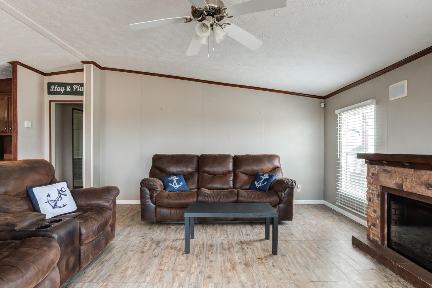 2446 Turkey Ridge Justiceburg, TX 79330 - Photo 8 of 50 a living room with furniture and a fireplace