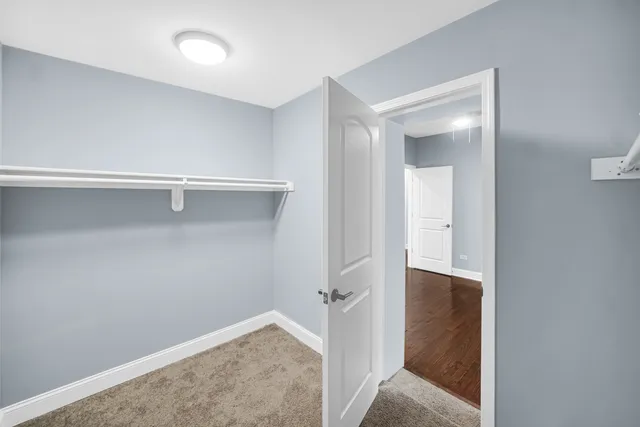 a view of hallway with closet