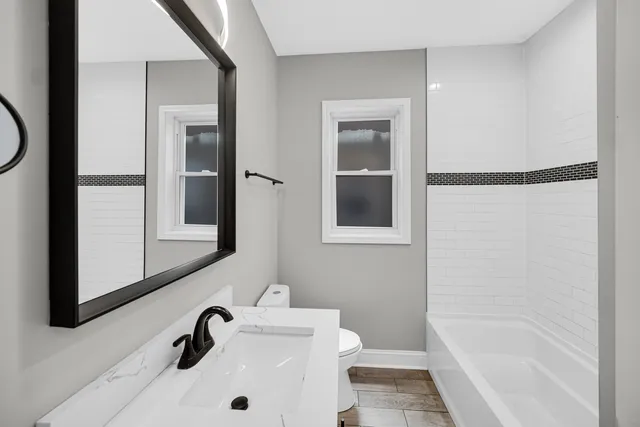 a bathroom with a sink and a bathtub