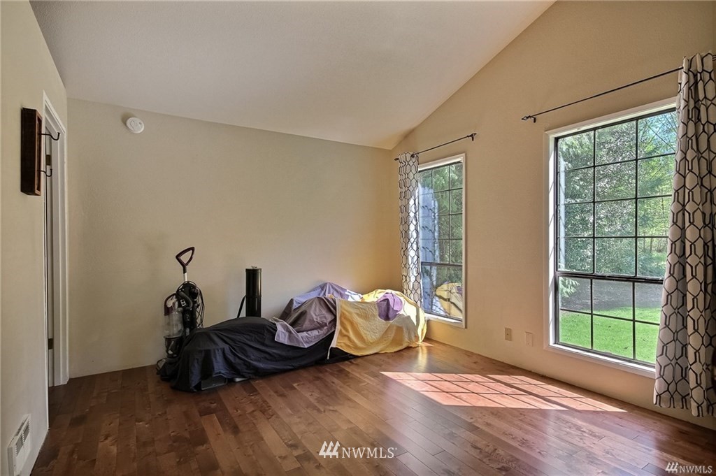 508 228th Street Southeast Bothell, WA 98021 - Photo 13 of 22 a living room with furniture and a window