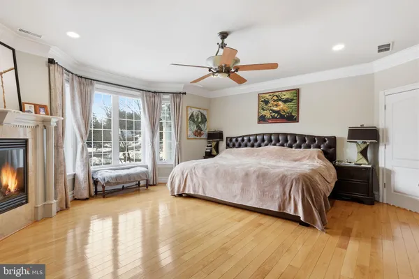 a kitchen with stainless steel appliances granite countertop a refrigerator and a stove