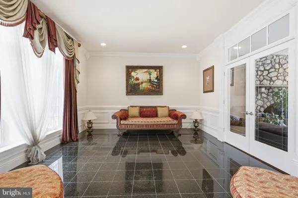 a living room with furniture and a table