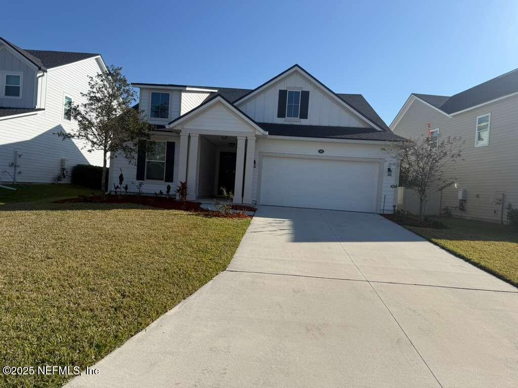 101 Ness Circle St. Augustine, FL 32095 - Photo 1 of 18 a front view of house with yard