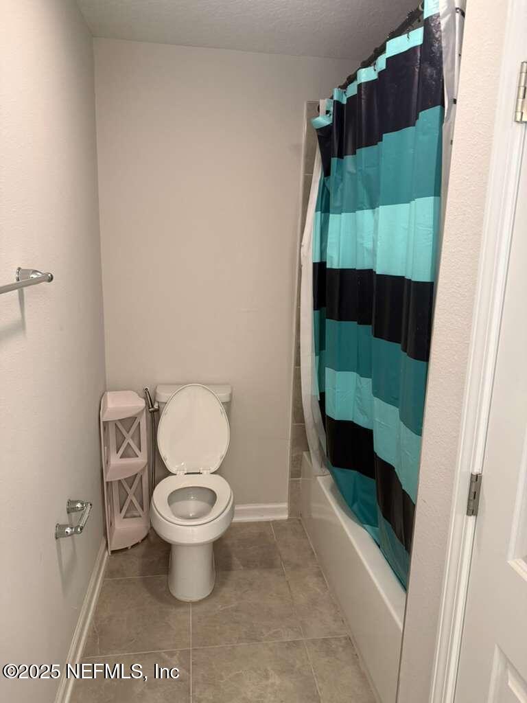 101 Ness Circle St. Augustine, FL 32095 - Photo 15 of 18 a bathroom with a toilet and a sink