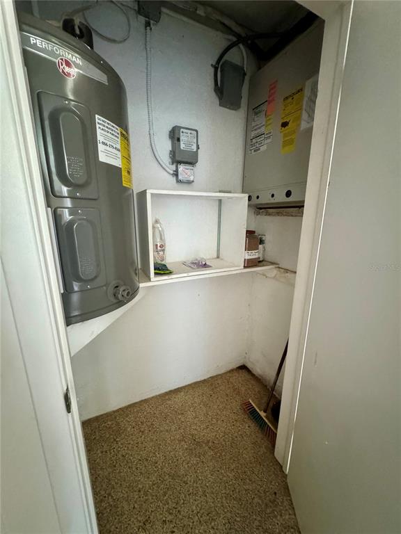 11201 80th Avenue, Unit 101 Seminole, FL 33772 - Photo 19 of 31 a view of storage and utility room with washer and dryer