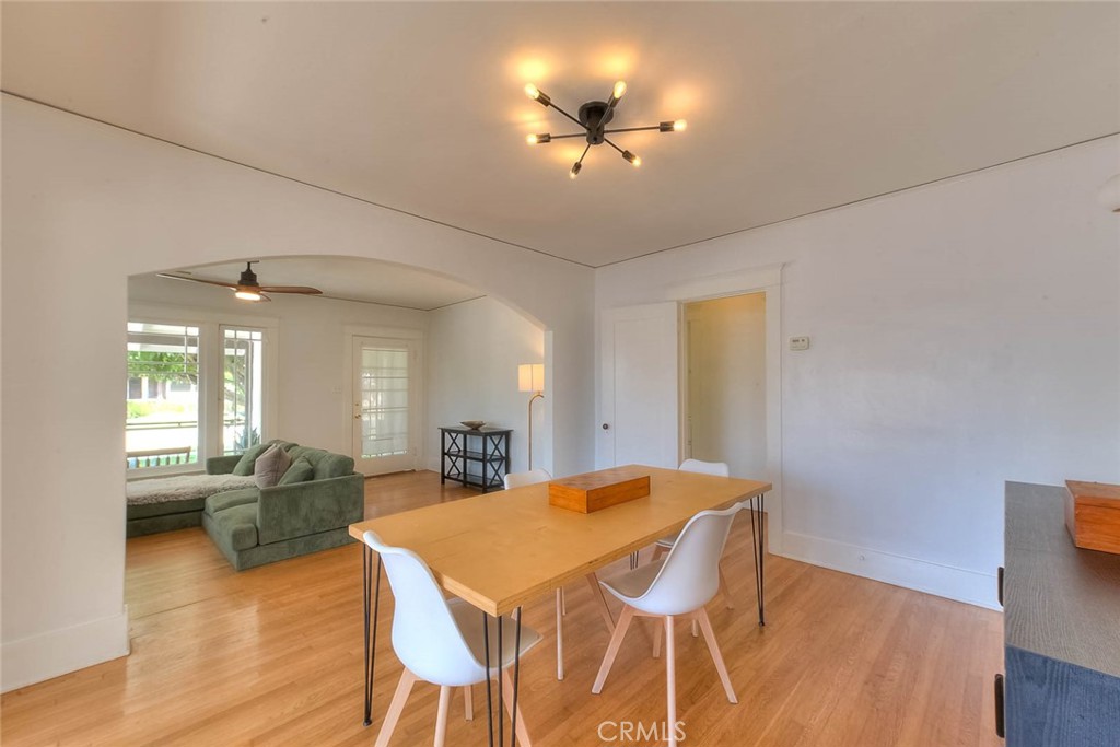 3222 Locust Street Riverside, CA 92501 - Photo 13 of 35 a view of a dining room with furniture and wooden floor