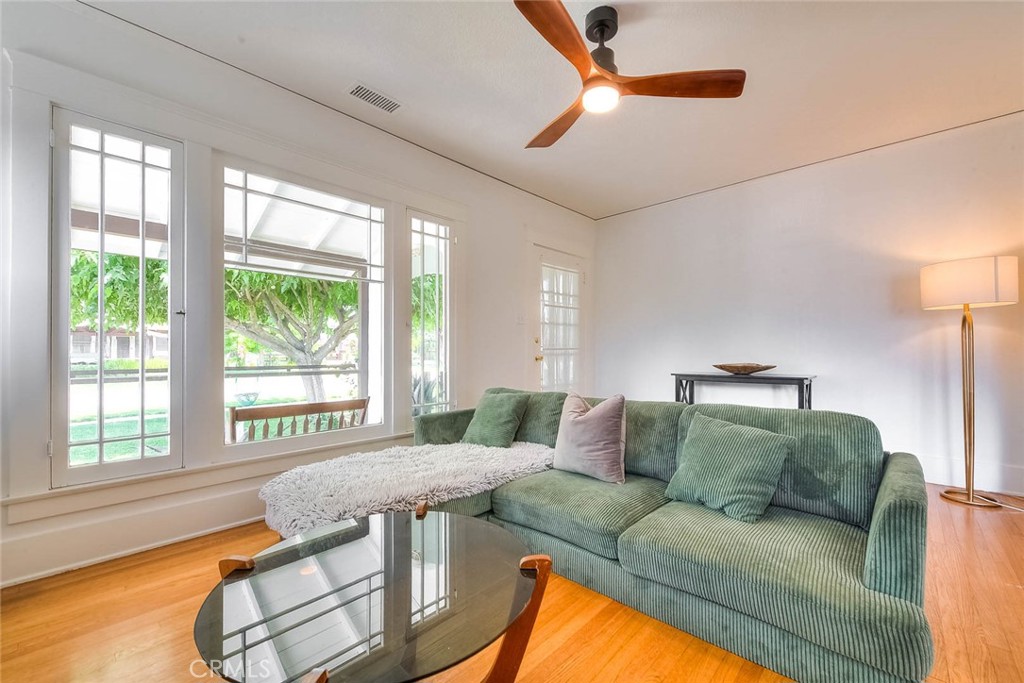 3222 Locust Street Riverside, CA 92501 - Photo 19 of 35 a living room with furniture and a large window