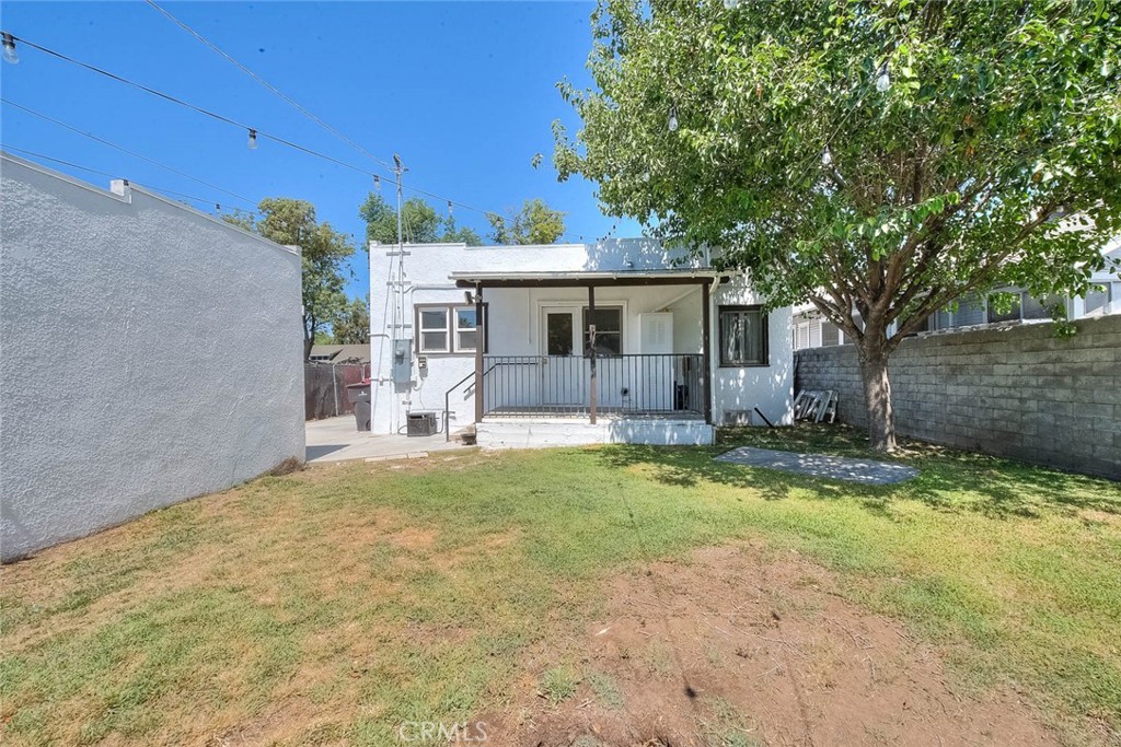 3222 Locust Street Riverside, CA 92501 - Photo 31 of 35 a view of a house with backyard and a tree