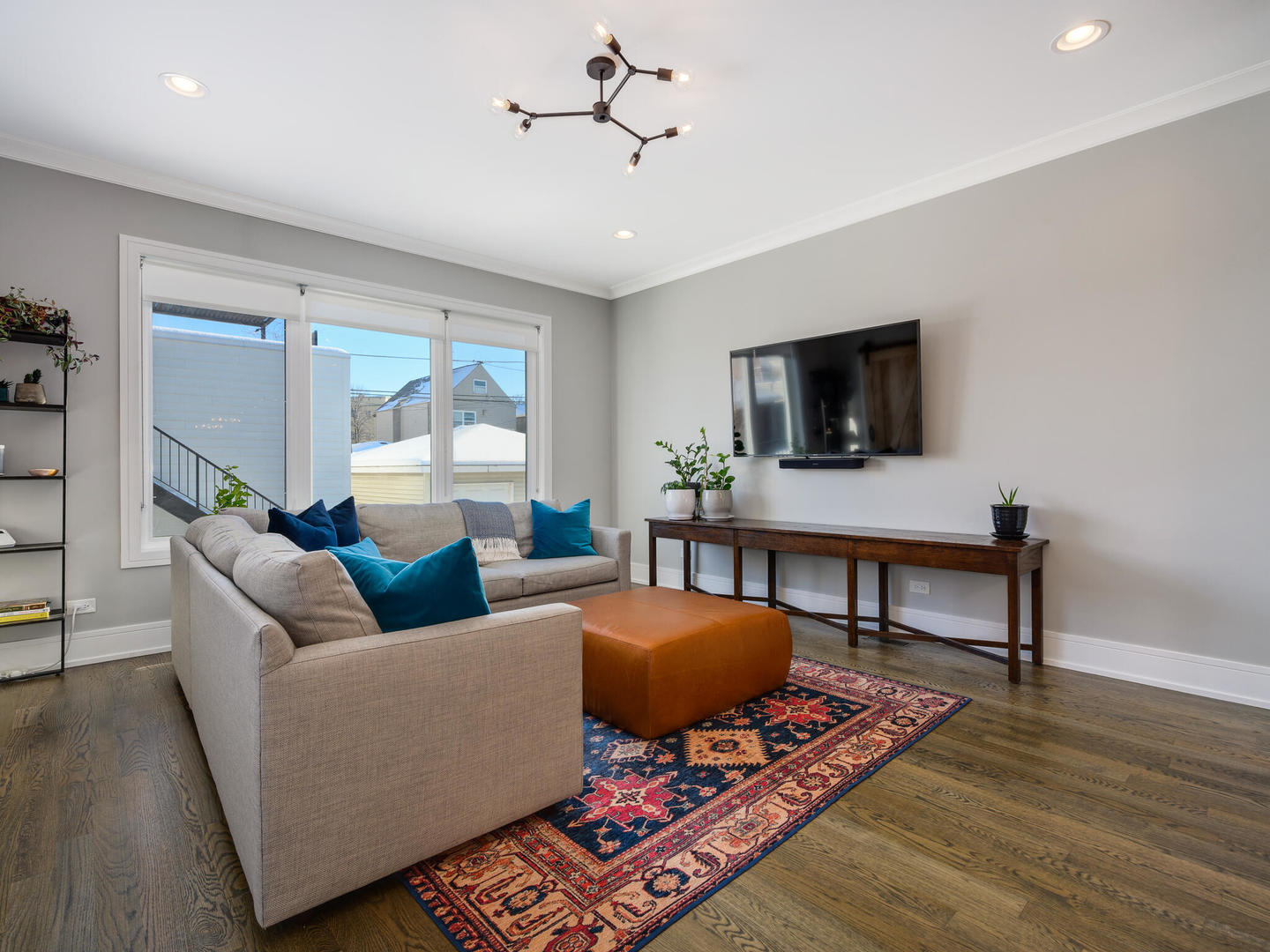 2919 North Dawson Avenue Chicago, IL 60618 - Photo 14 of 38 a living room with furniture and a flat screen tv