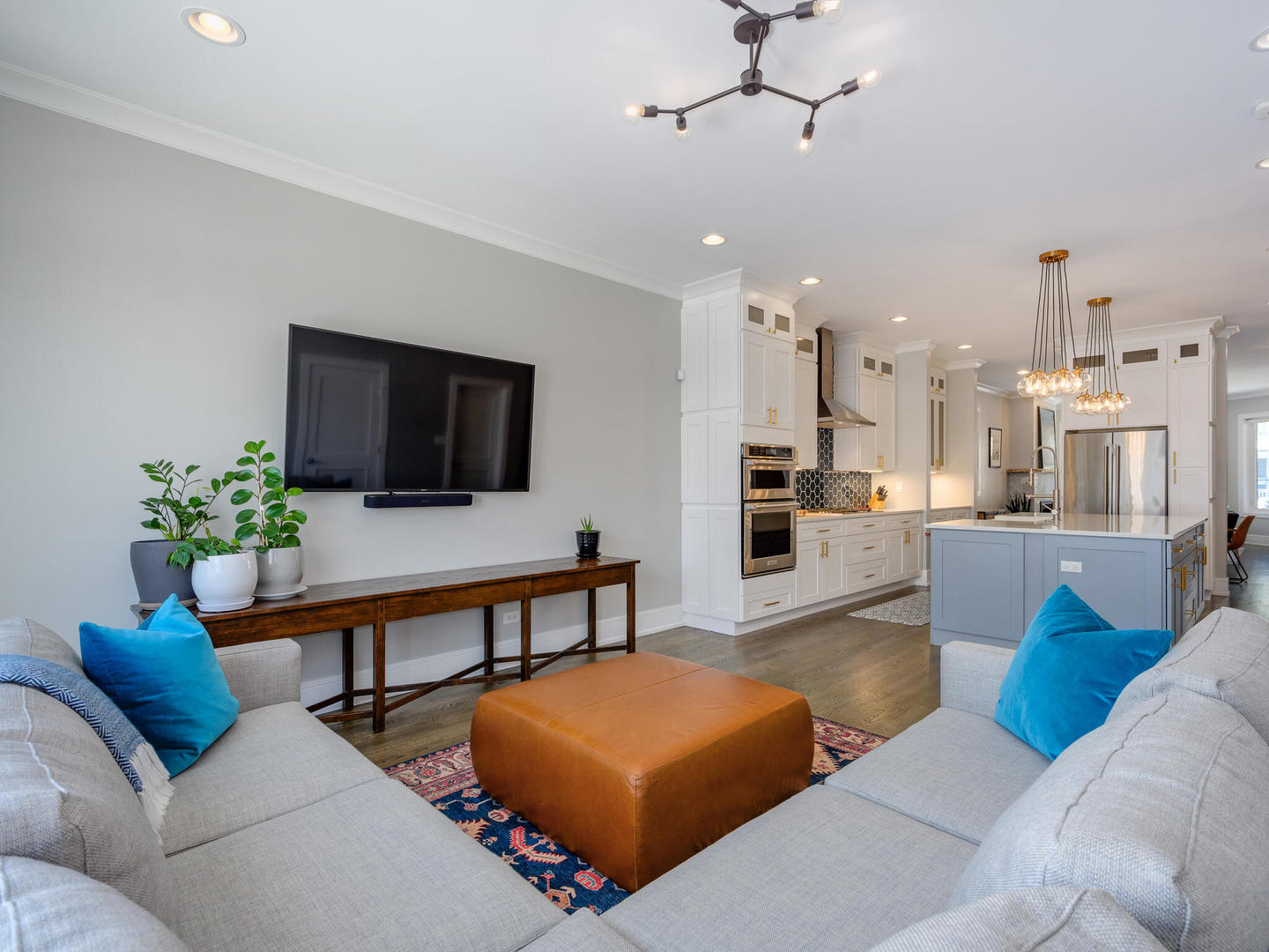 2919 North Dawson Avenue Chicago, IL 60618 - Photo 15 of 38 a living room with furniture and a flat screen tv
