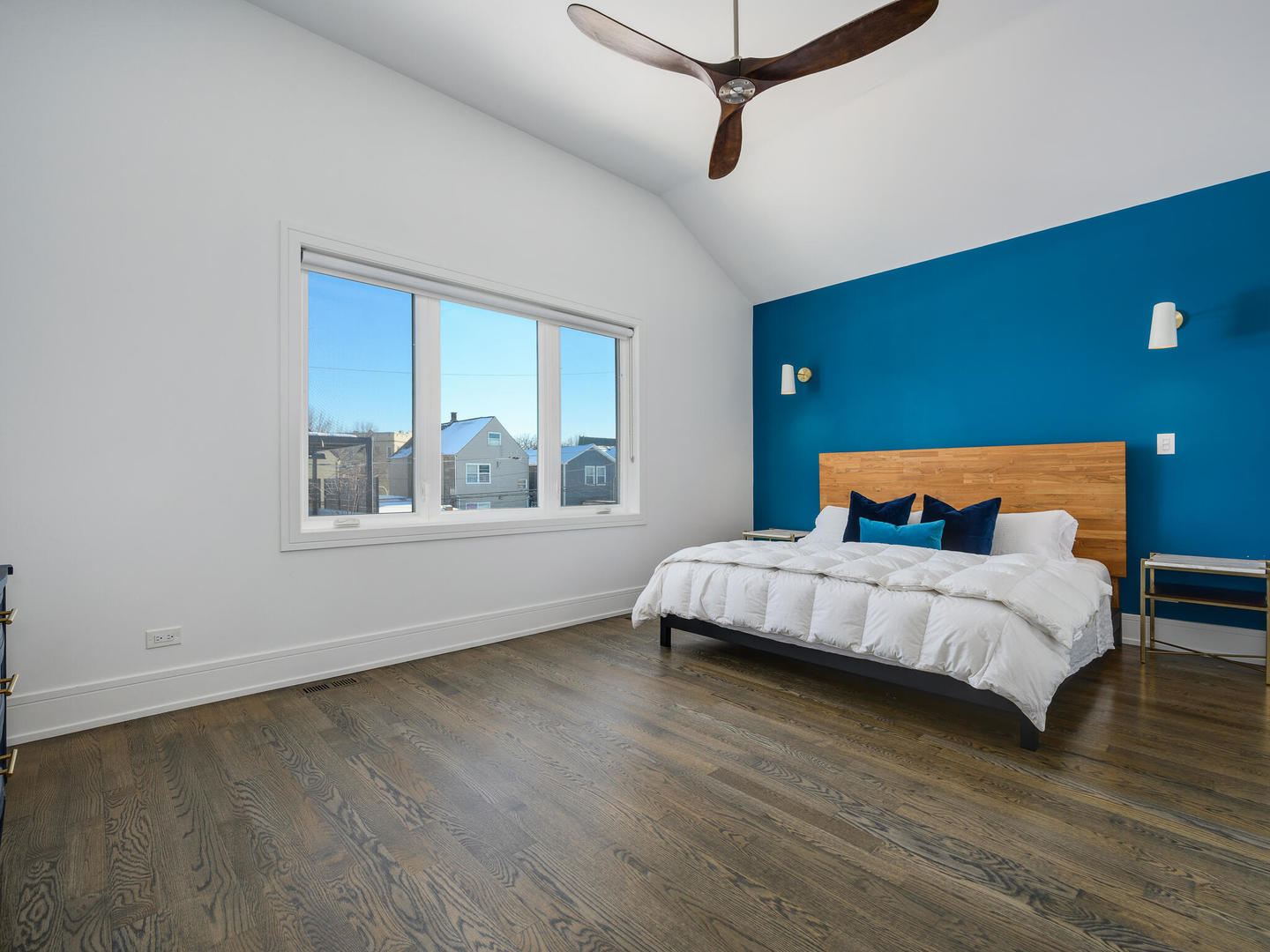 2919 North Dawson Avenue Chicago, IL 60618 - Photo 17 of 38 a bedroom with a bed and wooden floor