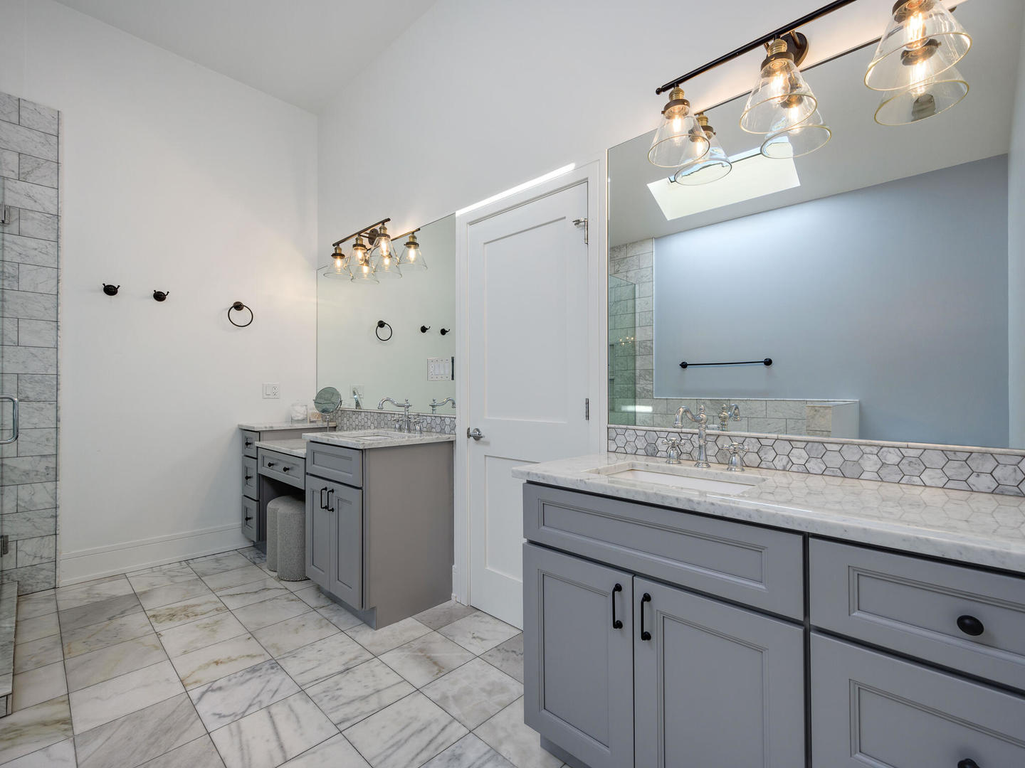 2919 North Dawson Avenue Chicago, IL 60618 - Photo 18 of 38 a bathroom with a granite countertop sink and a mirror