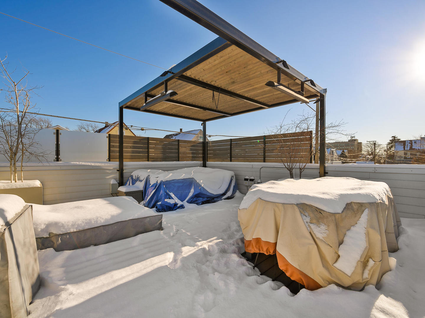 2919 North Dawson Avenue Chicago, IL 60618 - Photo 34 of 38 a view of patio with a table and chairs under an umbrella