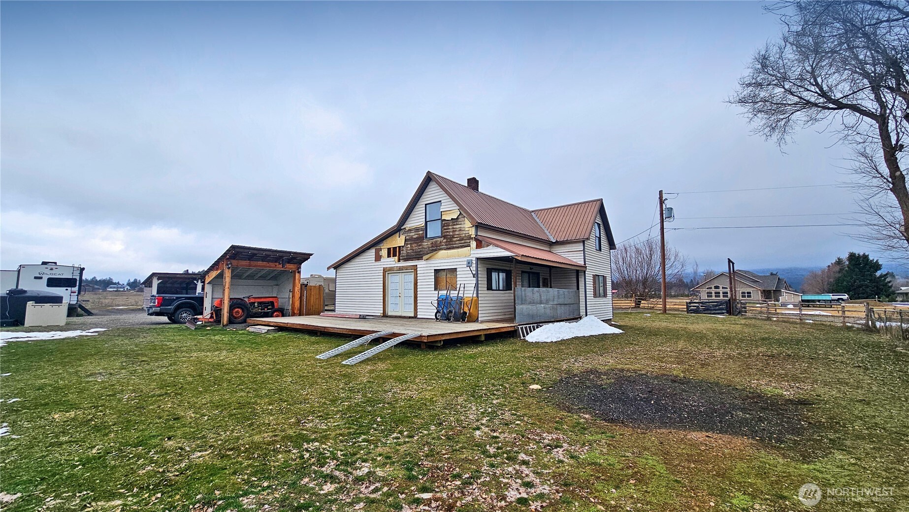 1030 Pease Road Cle Elum, WA 98922 - Photo 11 of 29 a view of a house with a big yard and large trees