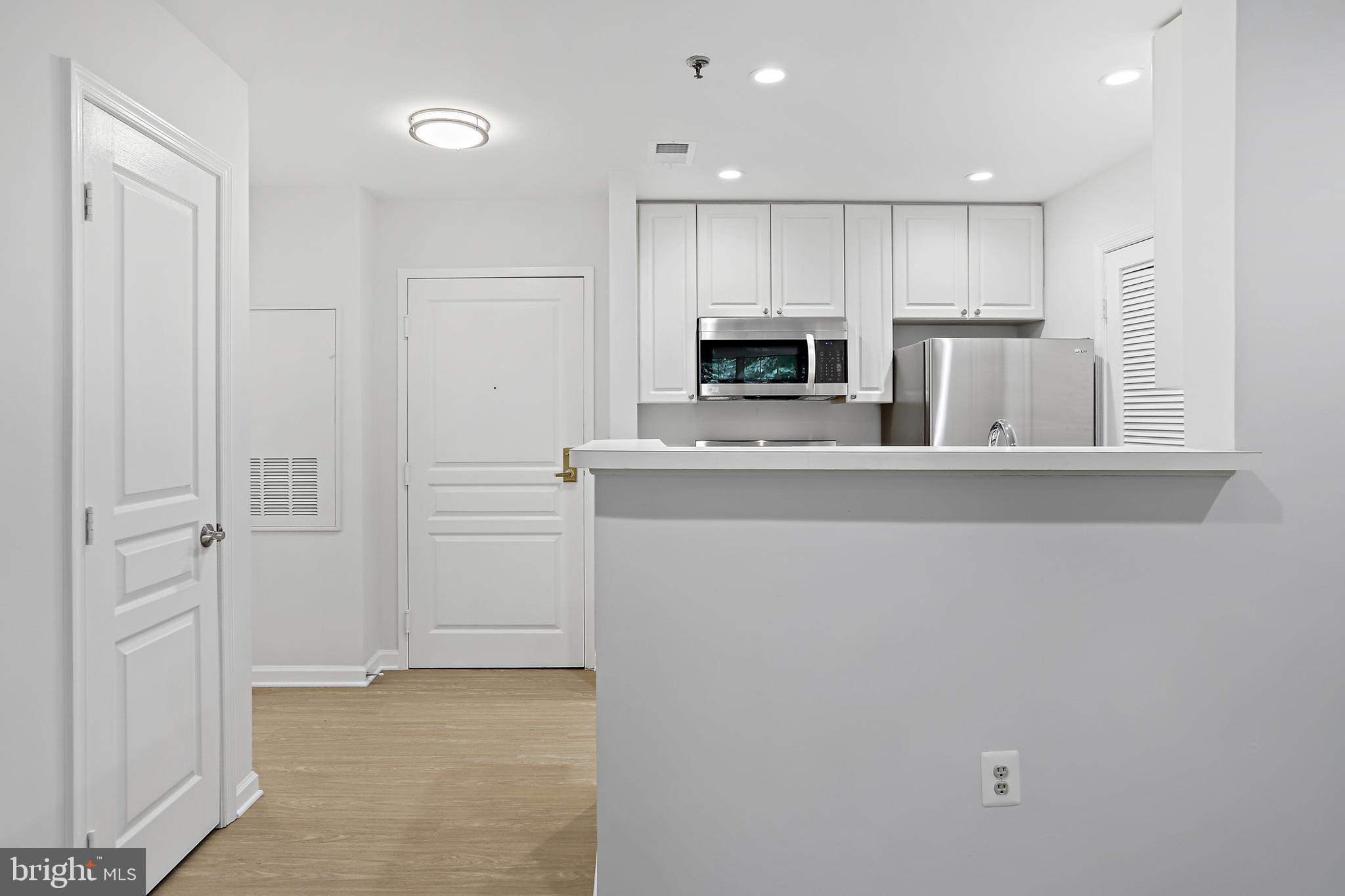 5563 Seminary Road, Unit 208 Falls Church, VA 22041 - Photo 11 of 33 Kitchen and coat closet