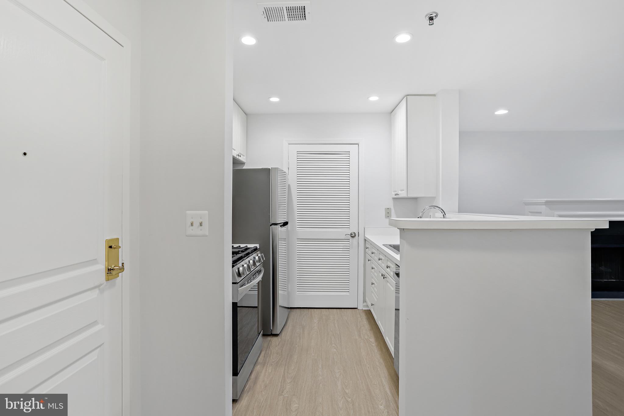 5563 Seminary Road, Unit 208 Falls Church, VA 22041 - Photo 4 of 33 Kitchen into laundry room