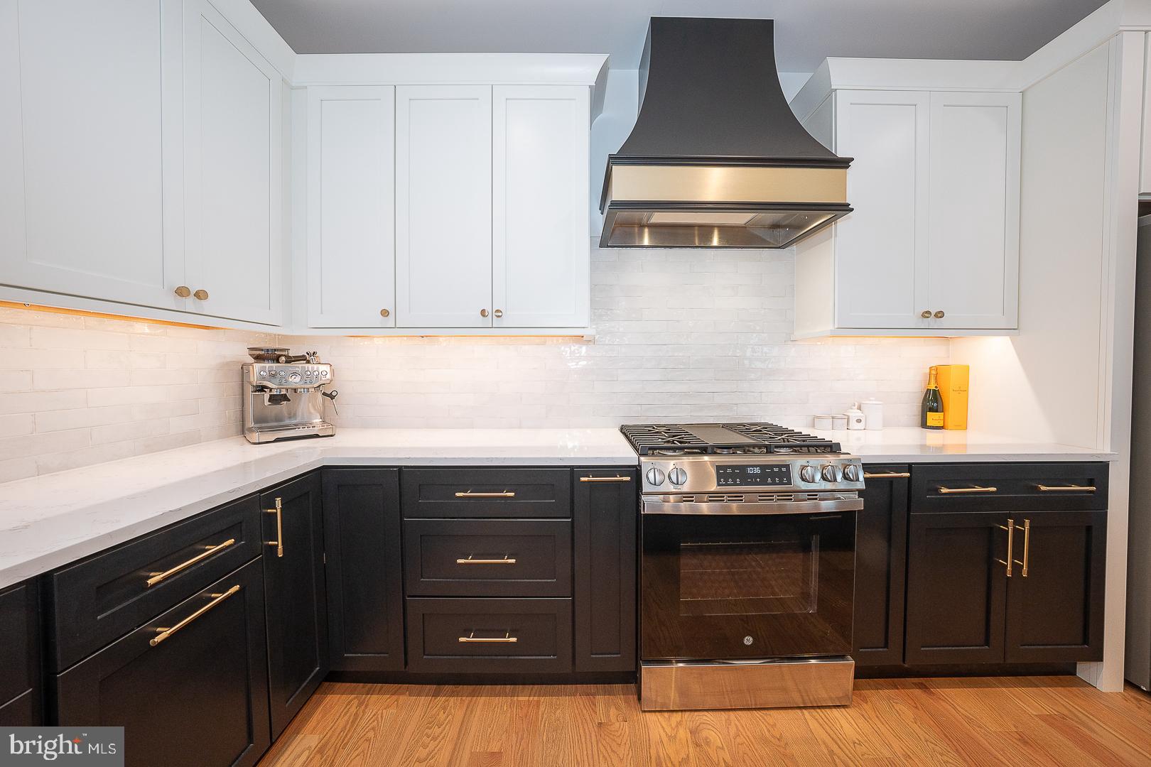 217 Namar Avenue Exton, PA 19341 - Photo 28 of 85 a kitchen with a stove and a cabinet