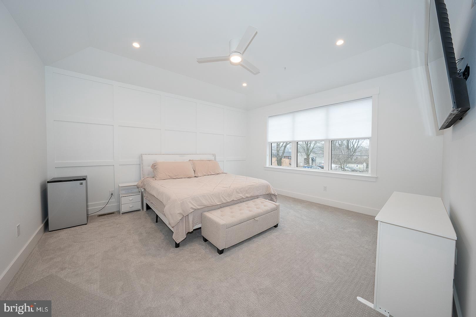217 Namar Avenue Exton, PA 19341 - Photo 33 of 85 a spacious bedroom with a bed and a large window