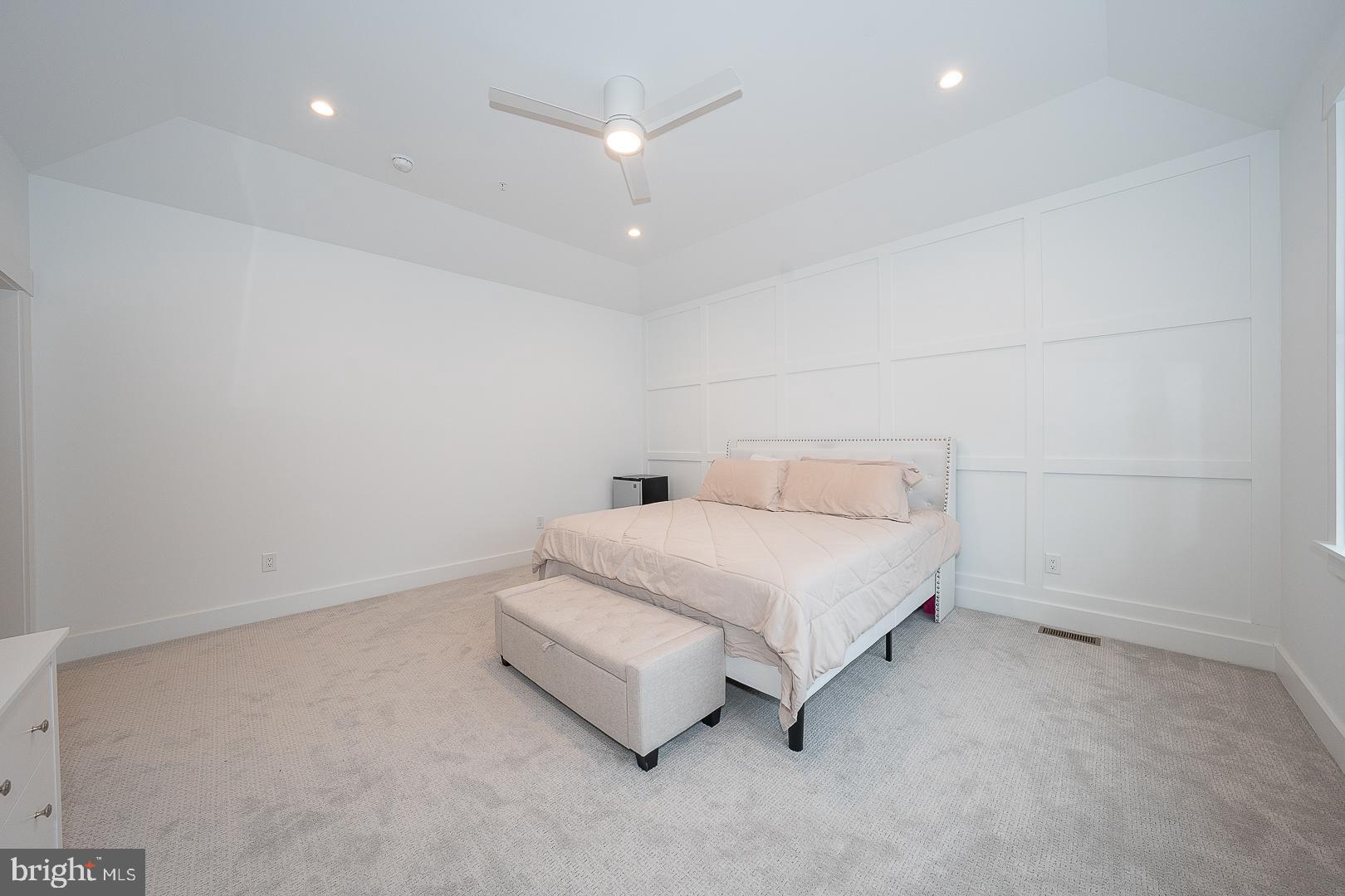 217 Namar Avenue Exton, PA 19341 - Photo 36 of 85 a spacious bedroom with a bed and a night stand