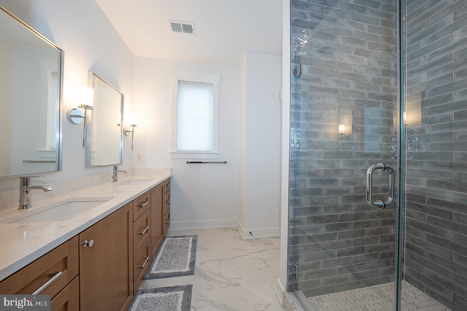 217 Namar Avenue Exton, PA 19341 - Photo 38 of 85 a bathroom with a shower and a sink