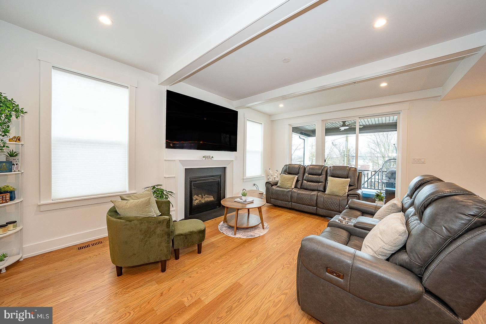 217 Namar Avenue Exton, PA 19341 - Photo 6 of 85 a living room with furniture fireplace and flat screen tv