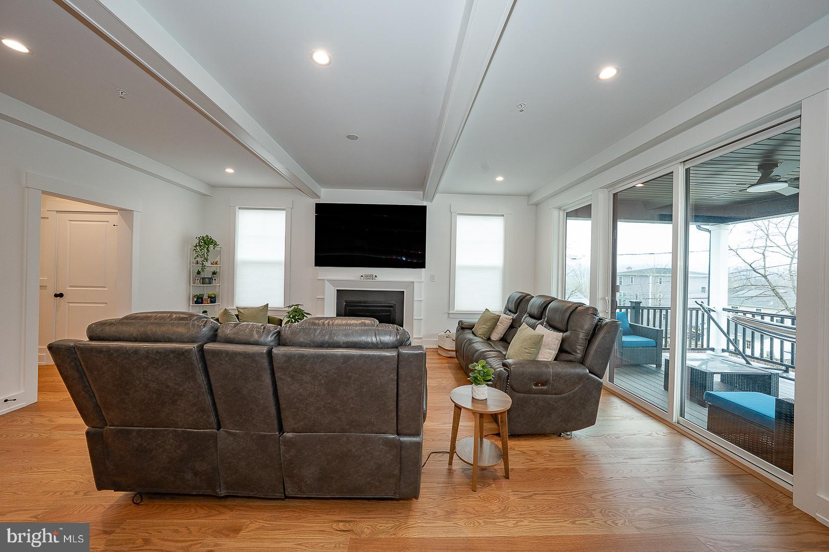 217 Namar Avenue Exton, PA 19341 - Photo 7 of 85 a living room with furniture and a flat screen tv