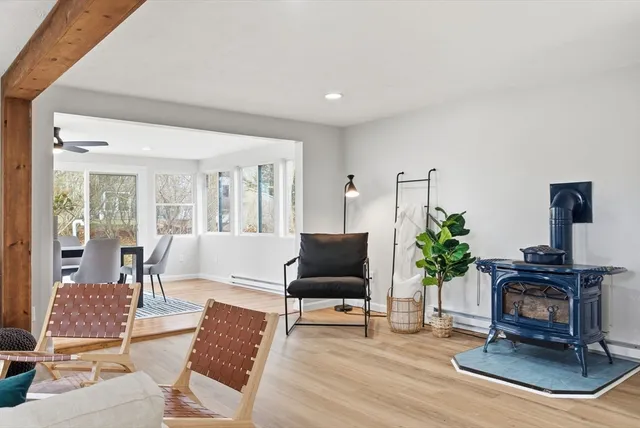 a bedroom with a bed and a night stand