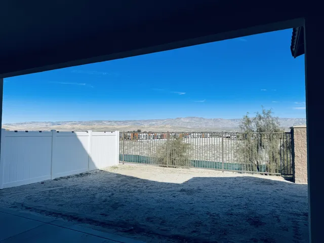 a view of roof with city view